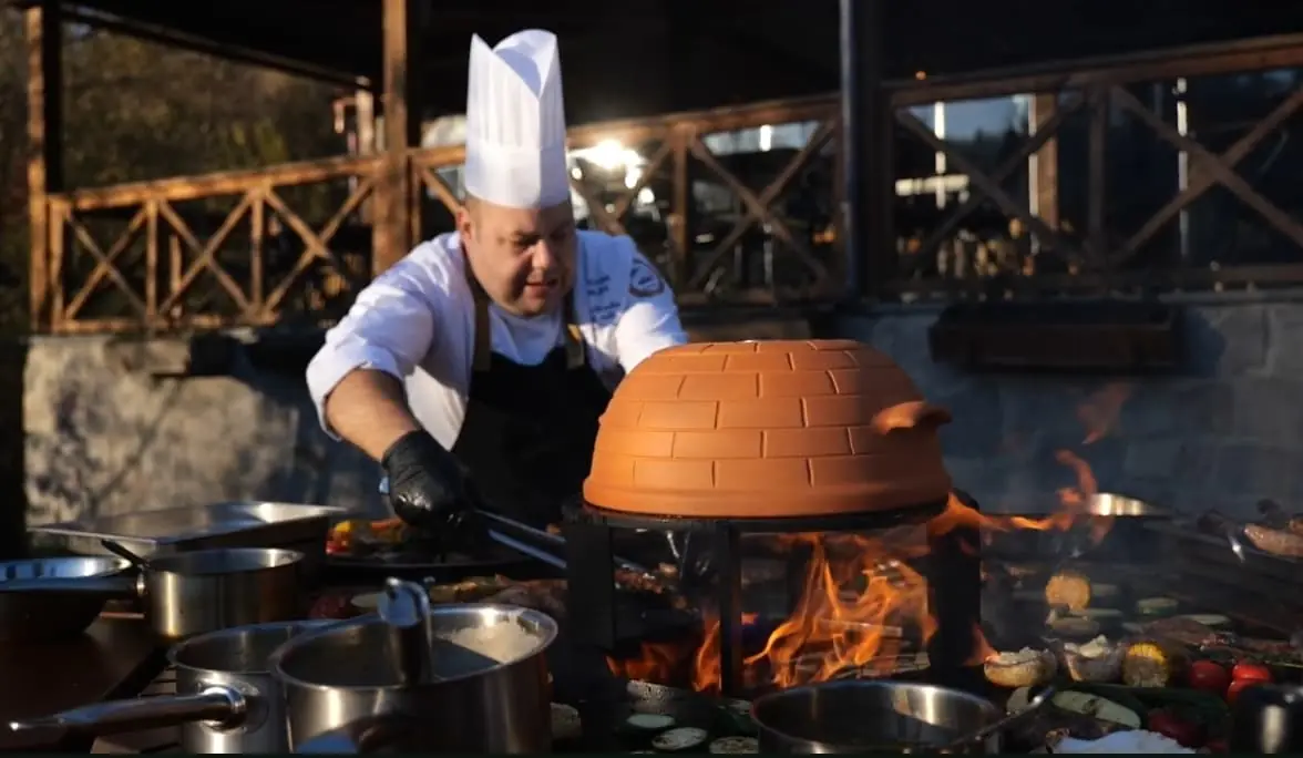 Chef cooking on CRATERFLAME® Meteorite Solid